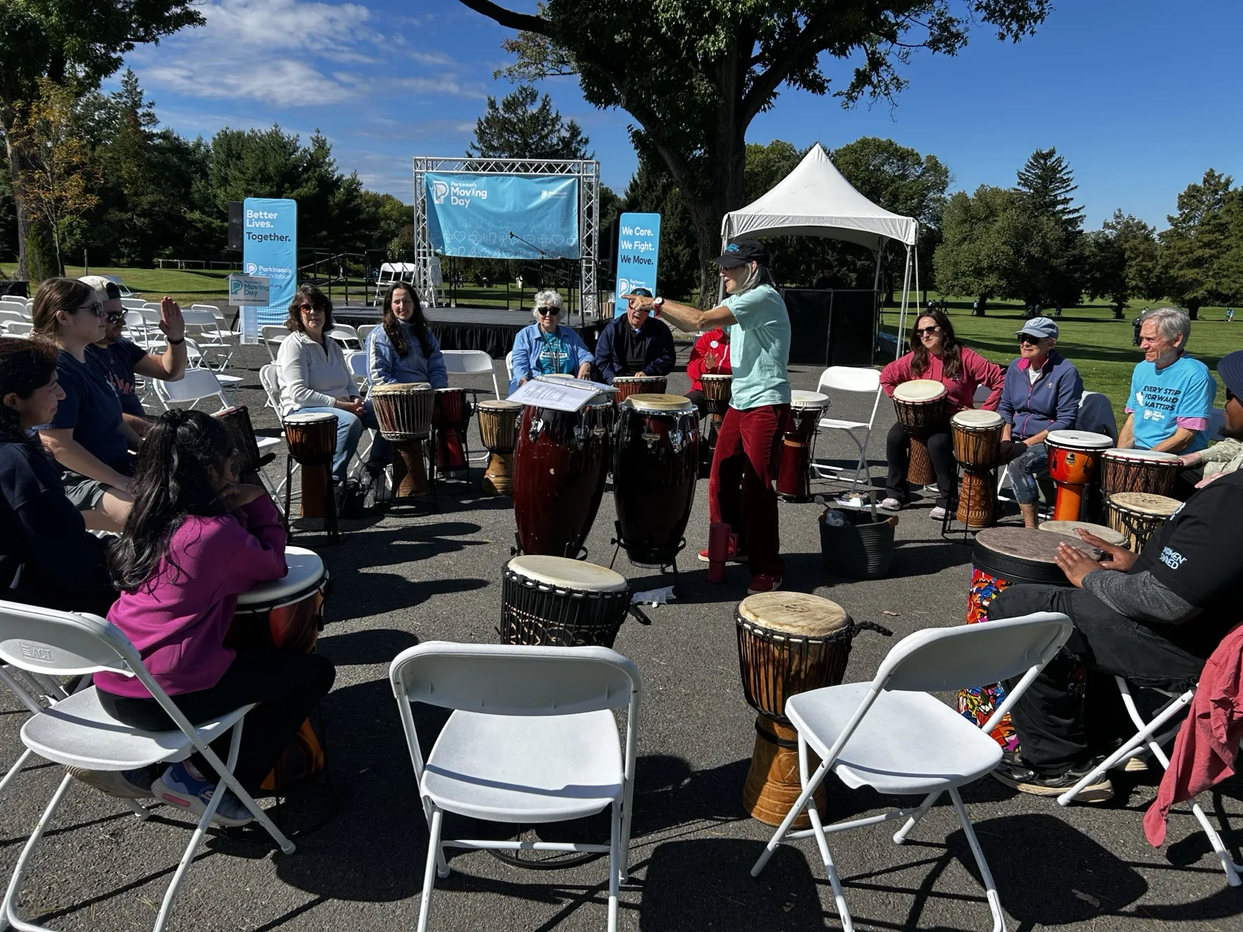 Moving Day New Jersey participants playing drums with Pulse Synergy