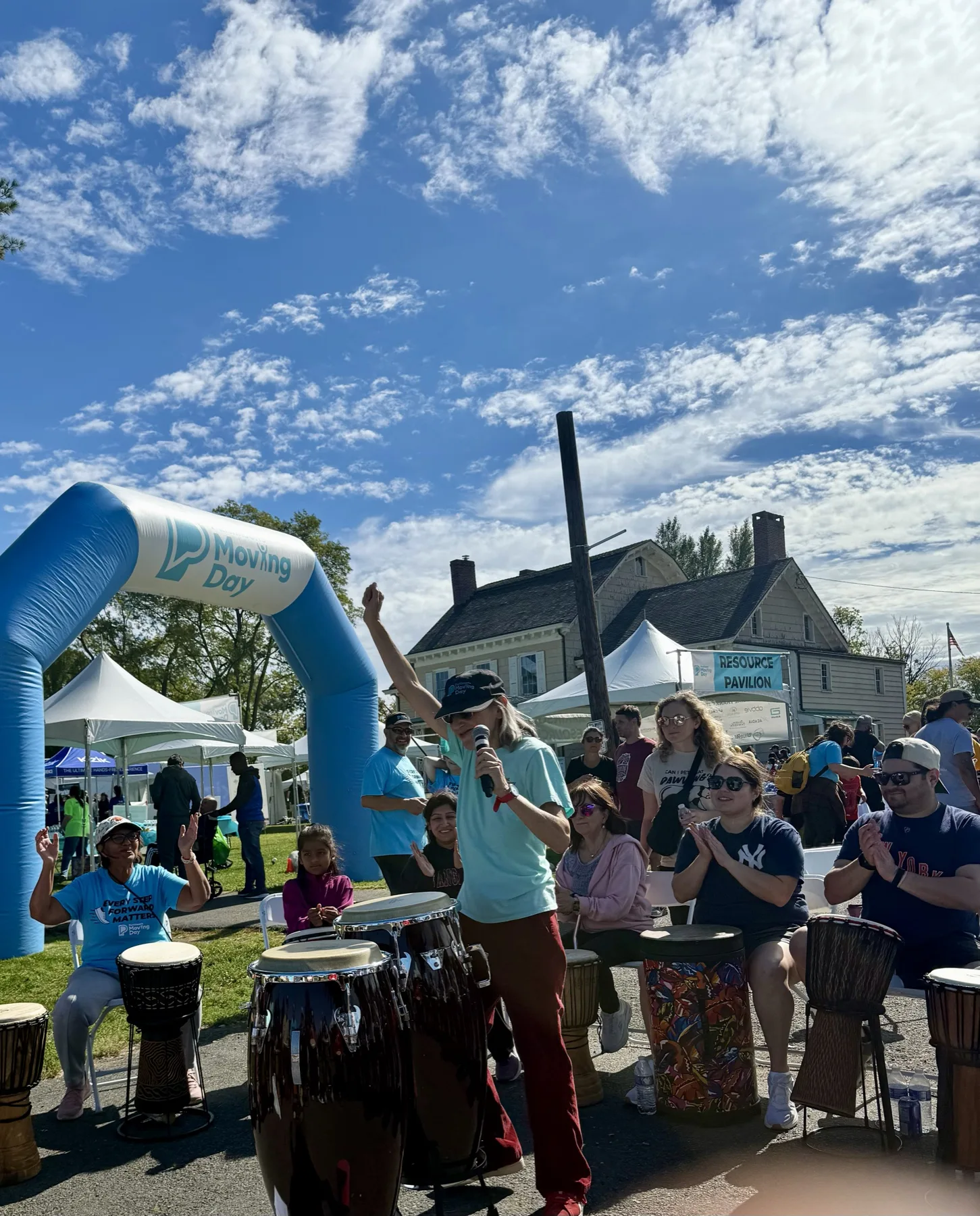 GG Glazer leading a drum circle at Moving Day New Jersey