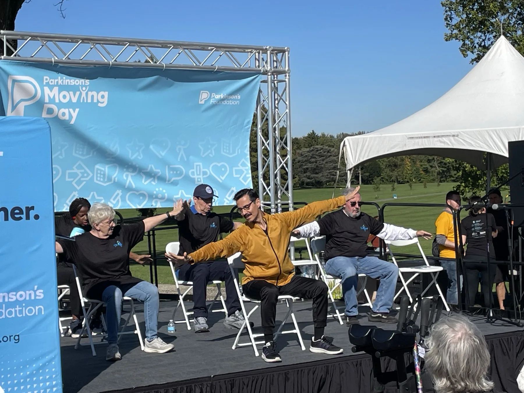 A seated movement demonstration on the Moving Day New Jersey stage